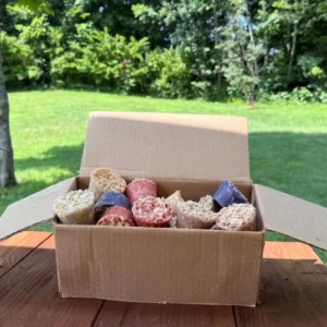 A 25 pack fire starter product. 25 Fire starters loose in a cardboard box.